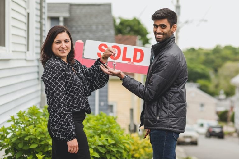 real estate agent handing over keys