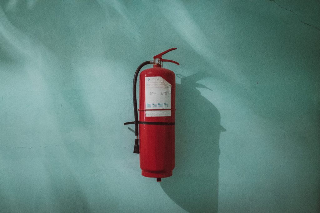 fire extinguisher highlighting need to maintain health code regulations at restaurants