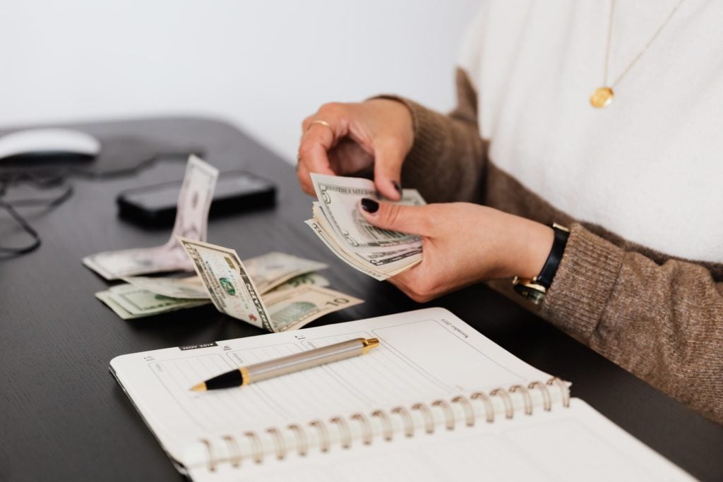 Worker Counting Money