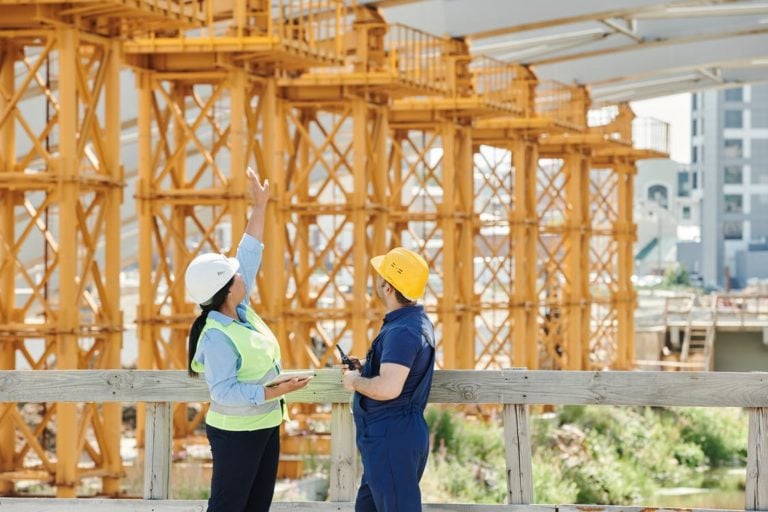 Construction workers discussing a plan