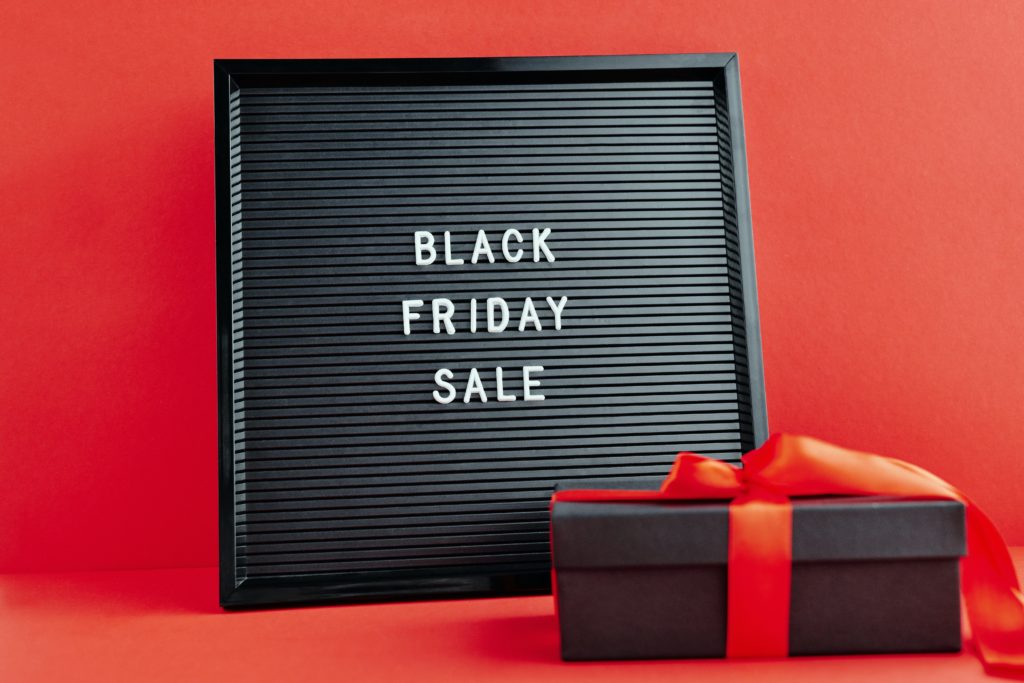 Sign to show working retail on black friday