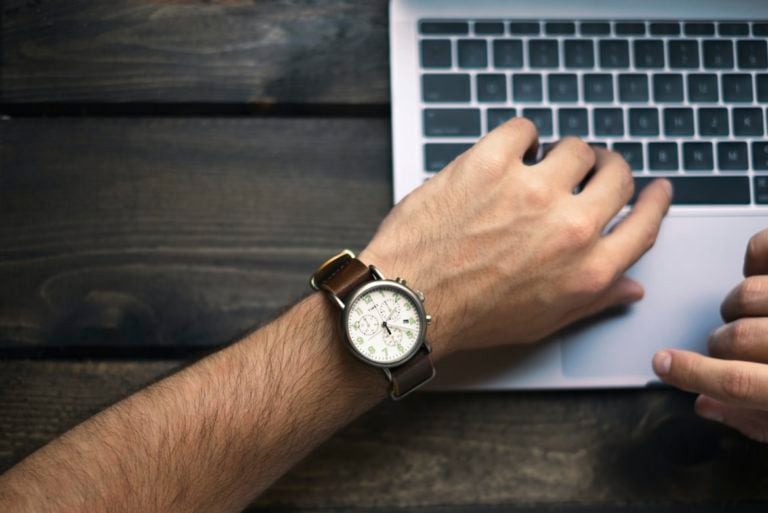 business owner using attendance tracking software