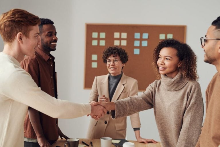 New employee meets team during work orientation