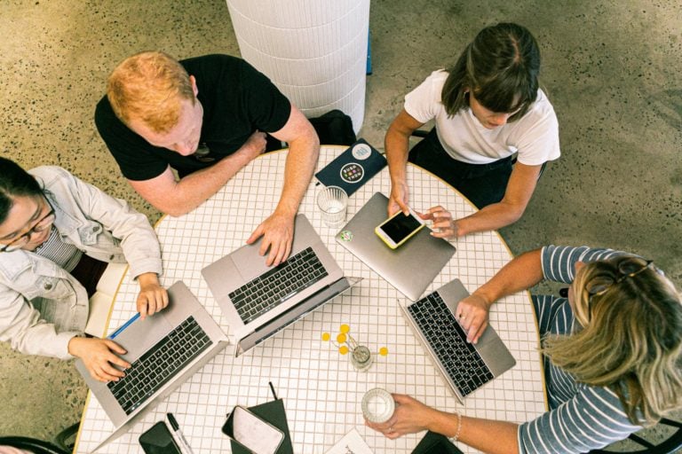 group of workers using email alternatives to communicate