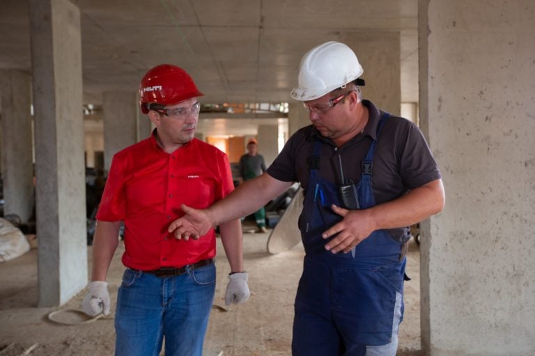 construction worker undergoing on the job training