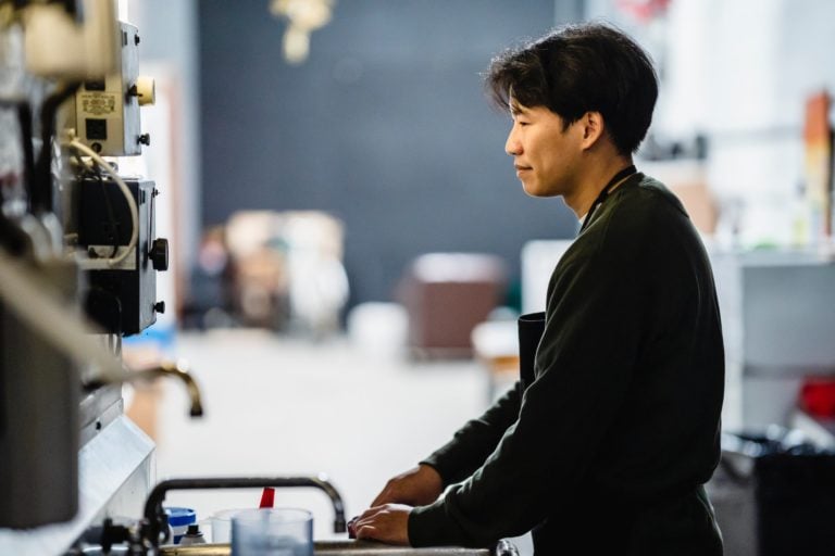 Worker getting started on the job after clocking in