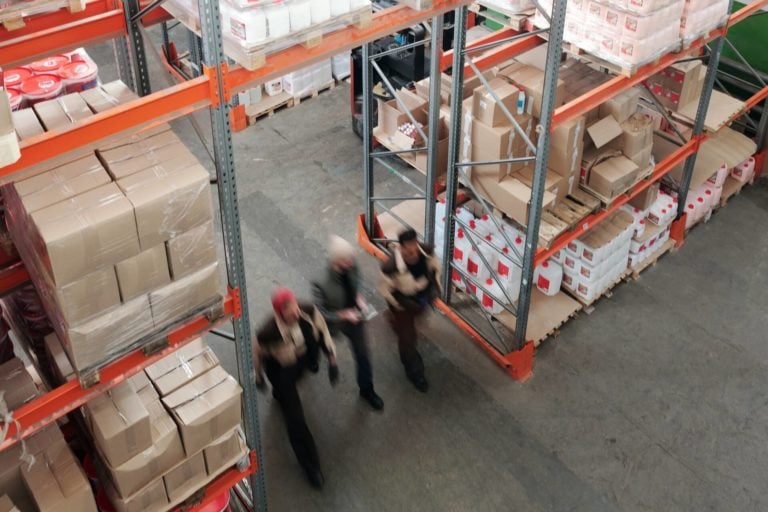 Warehouse workers on a split shift rush home to take their break.