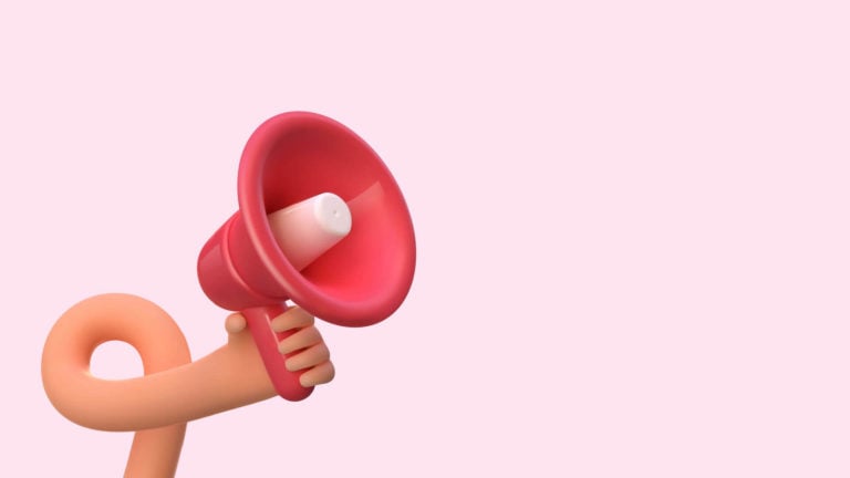 Graphic of a hand holding a megaphone to illustrate we’re hiring social media post examples