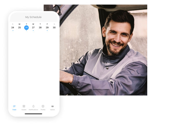 Man Smiling with a screenshot of Connecteam's Scheduling feature
