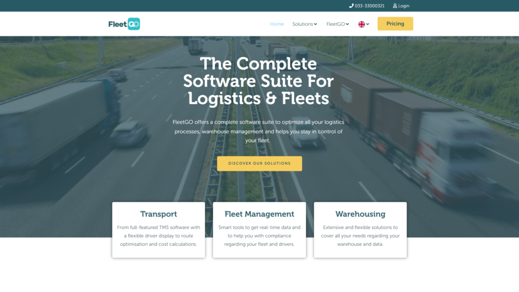Screenshot of the FleetGO homepage, showing information about the platform with an image of a road and trucks in the background.