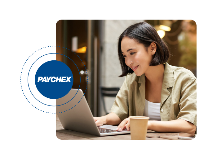 a picture of a woman looking at the computer and smiling with Paychex logo
