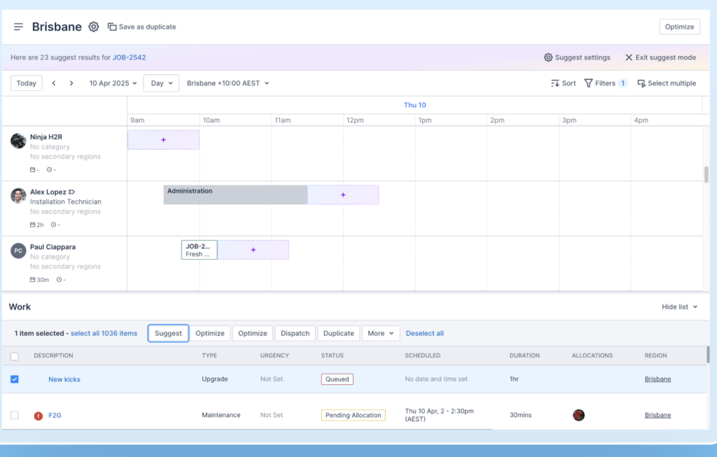 Skedulo’s new scheduling interface in Suggest mode for a job. The platform shows 23 suggested placements, and 3 workers appear on the day timeline with purple-outlined time slots containing plus signs, indicating where Skedulo thinks the job could fit.