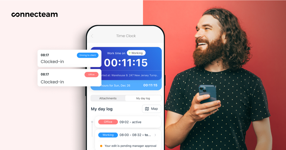 man looking to the left holding his phone, screen displays Connecteam's employee time clock