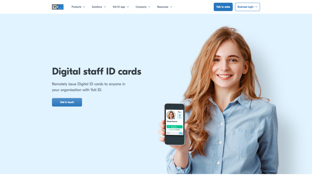 Yoti’s digital staff ID cards webpage, featuring a young woman holding a smartphone displaying a digital staff ID card, along with text promoting remote issuance of digital IDs.